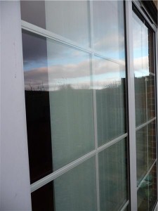 Tons of windows could require roller shades.