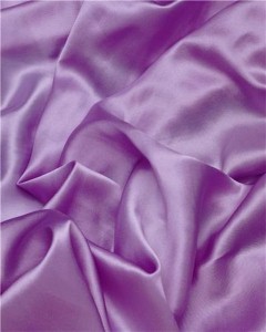 Roman shades from Blinds Chalet are made from polyester materials that resemble silk among other fabrics.