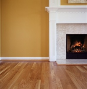 Decorations above the fireplace mantel should tie into colors and other features of a room.
