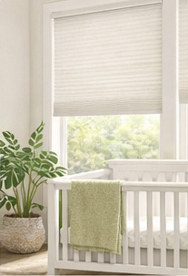 Window shade in a nursery with soft natural light