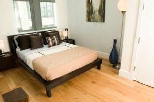 Aluminum mini blinds can look sophisticated in a contemporary bedroom.