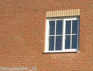 A bamboo sunscreen roller shade can present as attractive a view of the window treatment from the outdoors as inside the home.
