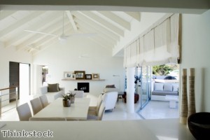 The right mix of neutrals or brighter colors can offset a white room to its best advantage.