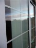 Tons of windows could require roller shades.