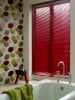 Go for red blinds for a pop of color.