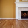 Decorations above the fireplace mantel should tie into colors and other features of a room.