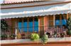 Blinds help homeowners enjoy exterior window boxes