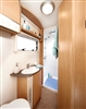 Refresh an old bathroom with pleated shades