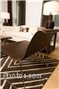 Roller shades can maintain a rug's color