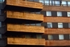 Faux wood blinds can create illusion of space