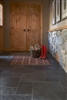 Combine ceramic tiles and horizontal fabric shades for a bathroom renovation