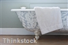 Older bathrooms can be given new life with small, inexpensive changes.