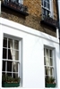 Combining Roman shades, valance can obscure ugly view
