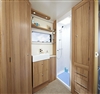 Highlight an uncluttered room with wood blinds
