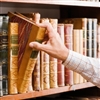 Organizing a family's book collection can be done according to subject, genre or even color.