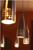 Lighting, solar screen shades can make a room appear more spacious