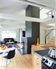 Great rooms often are located adjacent to a kitchen, the hub of the household.