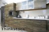 Kitchen rugs can soften the hard look of appliances and flooring.