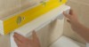 A variety of shelving options extend the storage possibilities within a bathroom.