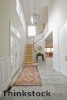 An entryway can be elaborate or simple, but should tie into the rest of the home's decor.