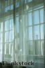 Floor-to-ceiling window treatments can give the illusion of higher ceilings in a room.