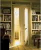 Sliding door systems can instantly open up traffic flow in small apartments.